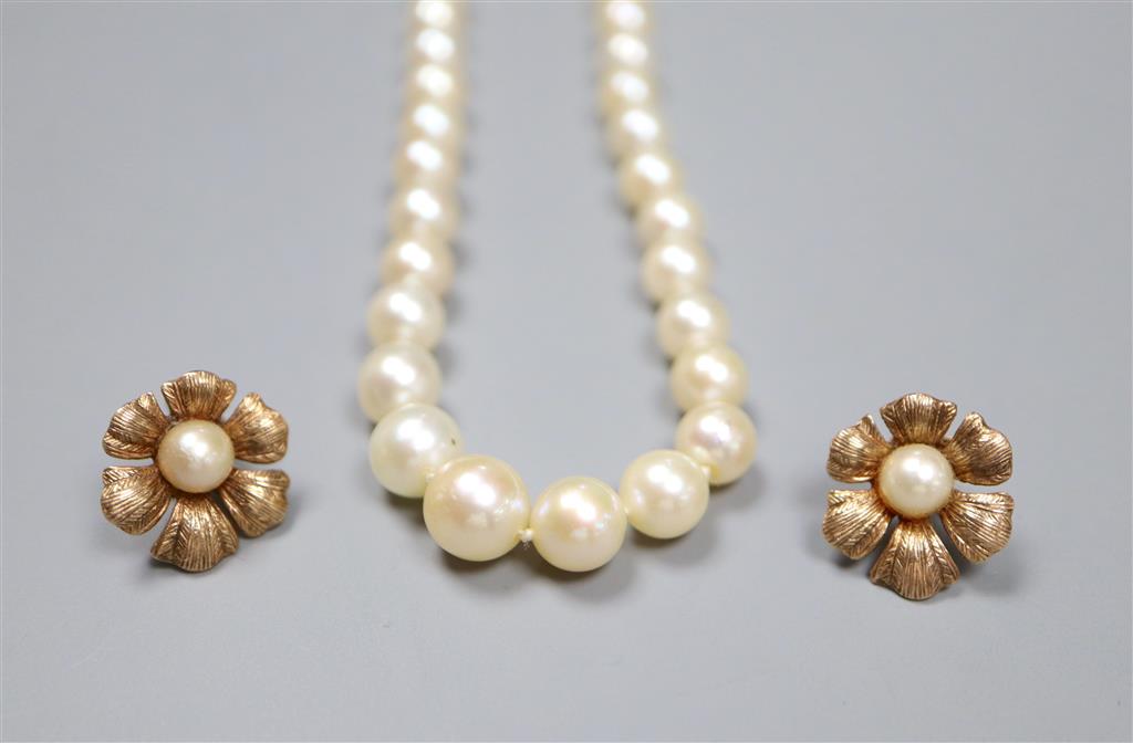 A single strand cultured pearl necklace with yellow metal clasp and a pair of 9ct gold and cultured pearl earrings,
